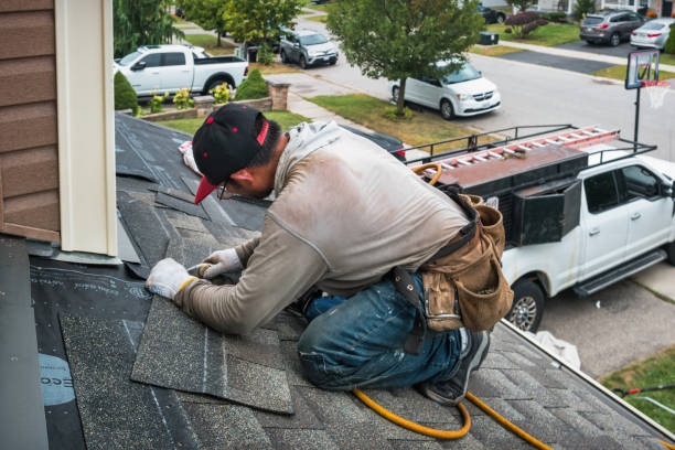 Professional Roof Installation technician working in Lansing, NY
